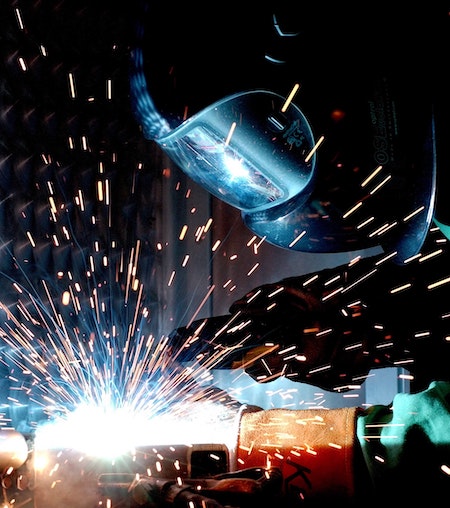 Industry worker welding.